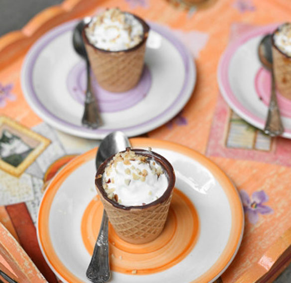 Chocup® with espresso, whipped cream and hazelnut grains